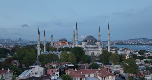 Establishing Orbiting Aerial Drone Shot of a Hagia Sophia Holy Grand Mosque with Bosphorus Bridge