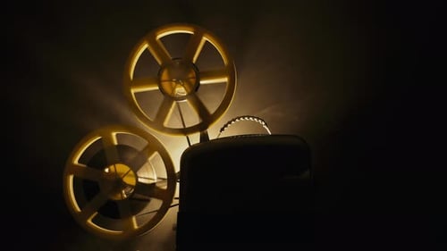 Vintage 8Mm Film Projector Rotating Reels Nostalgic Charm of Classic Cinema
