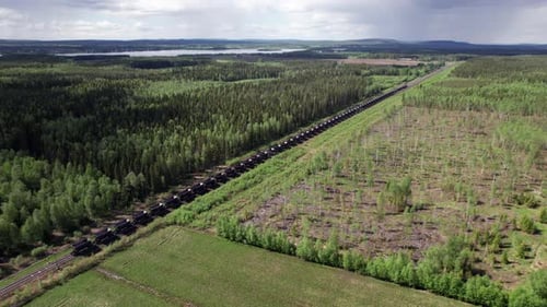 Drone View of Empty Swedish Freight Train, Cargo, Scandinavia, Kiruna, Luleå, Forest Landscape, Pull