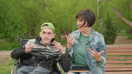 Lively Scene Of Woman And Girl Sharing Laughs In Park Enthusiastic Outdoor Encounter Showcasing