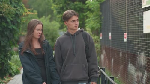 Youth Park Strolls Teenage Friends Wandering Through Tranquil Leafy Park Young Couple Casually