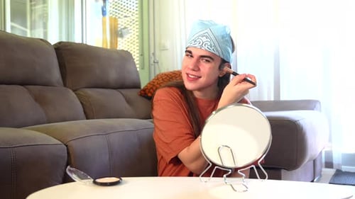 Young Adult Applying Makeup in Bright Home Setting