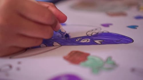 coloring with felt-tip markers, vibrant colors, drawing tools, education and creativity theme.