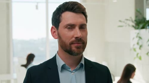 Smiling Confident Caucasian Business Man Executive Team Leader Male CEO in Corporate Office Looking