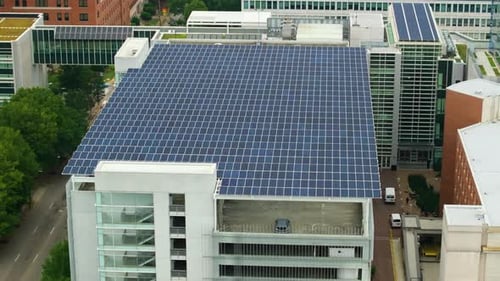 Green Electricity Generated From Solar Panels Installed As Shade Roof Over Parking Garage with