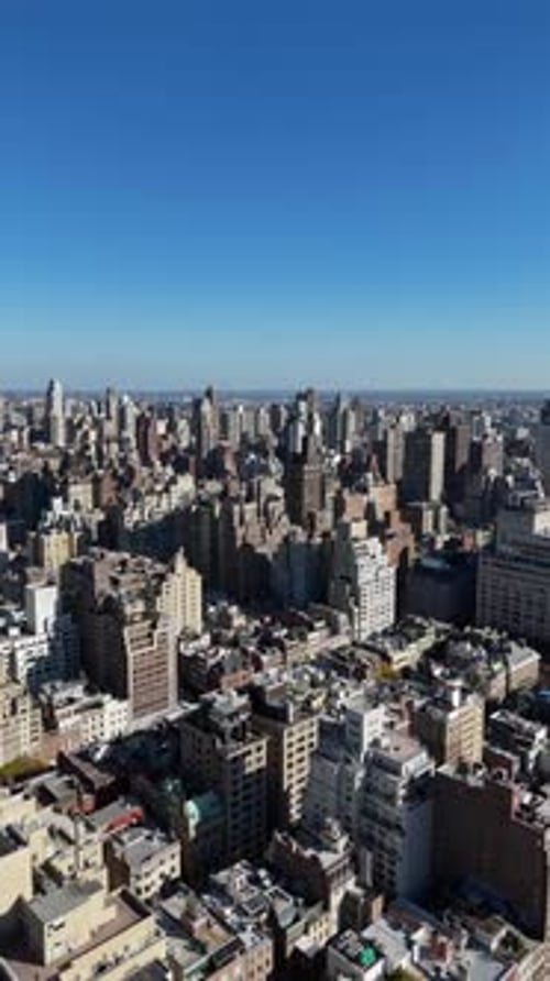 Aerial video above skyscrapers and skyline in Manhattan, New York