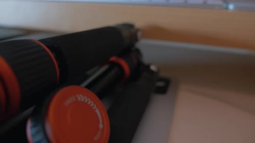 Close up of camera tripod indoors