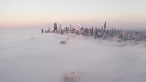 Aerial view of downtown Chicago with low fog