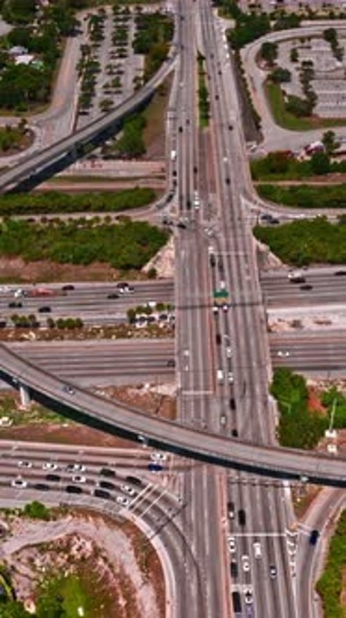 Aerial view of busy roadways in Miami, showcasing urban traffic patterns