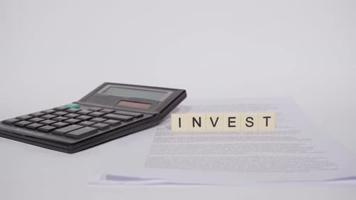 Calculator and Investment Concept