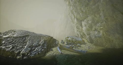Rocky Shoreline with Mist and Calm Waters at Twilight Near Cliffs