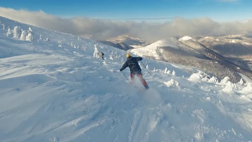 Skier Ride in Back-country Alps Mountains Free-ride Skiing