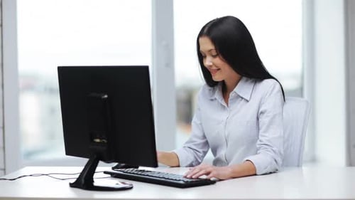 Attractive Business Woman Working with Computer in Office Attractive
