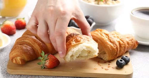 Delicious Croissants with Berries and Jams for Breakfast