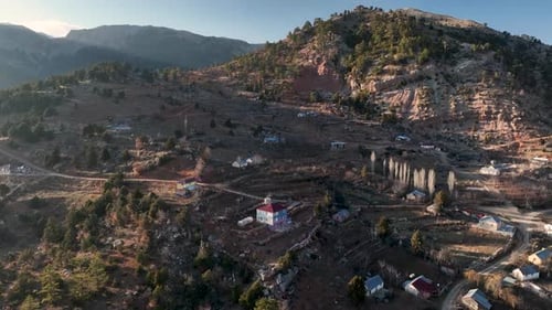 Beautiful Landscape of a Small Village on the Banks of a Mountain River