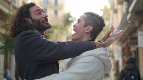 Happy Gay Couple Embraced in the Street