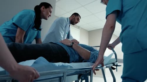 Emergency Department: Doctors, Nurses and Paramedics Run and Push Gurney / Stretcher with Seriously