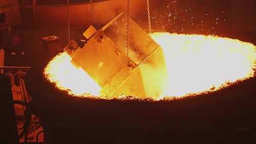 Molten Metal Pouring Processes are Crucial Activities That Take Place in an Industrial Foundry Stock