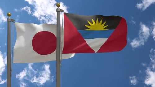 Japan and Antigua and Barbuda Flags Waving Realistically in Wind