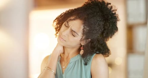 Neck, pain and woman in office at night for joint injury, muscle stress and poor posture at desk