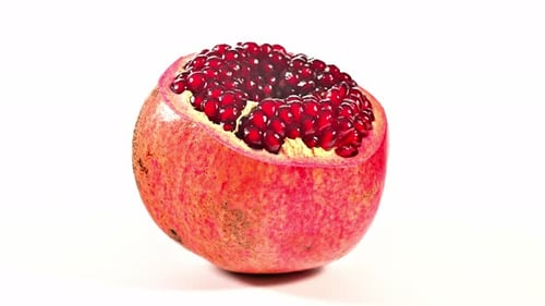 Delicious Pomegranate Seeds on White Background Still Life