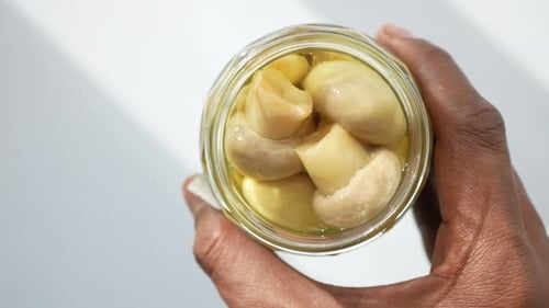 Top View of Canned Mushrooms on Table