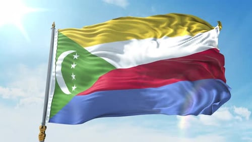 Realistic Comoros National Flag Waving against Blue Sky