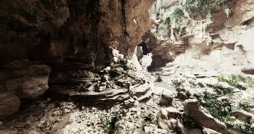 Exploring a Sunlit Cave with Rocky Formations and Lush Vegetation