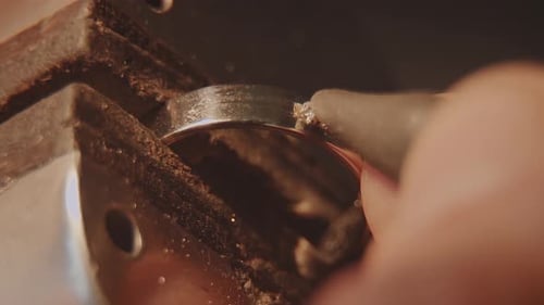 A CloseUp View of the Intricate Ring Processing Work Taking Place in a Metal Workshop