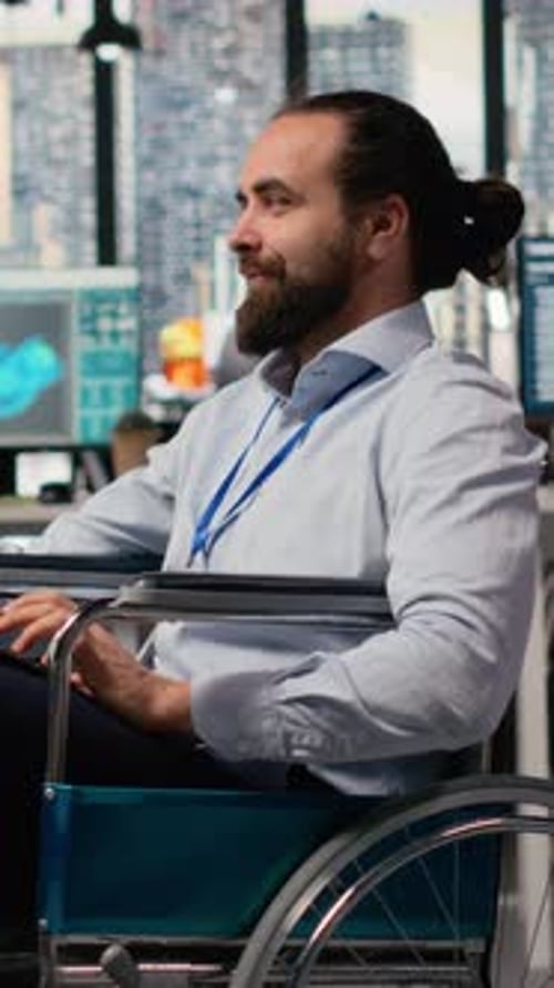 Man with Paraplegia in Inclusive RD Office Designs Green Technology Solar Panels