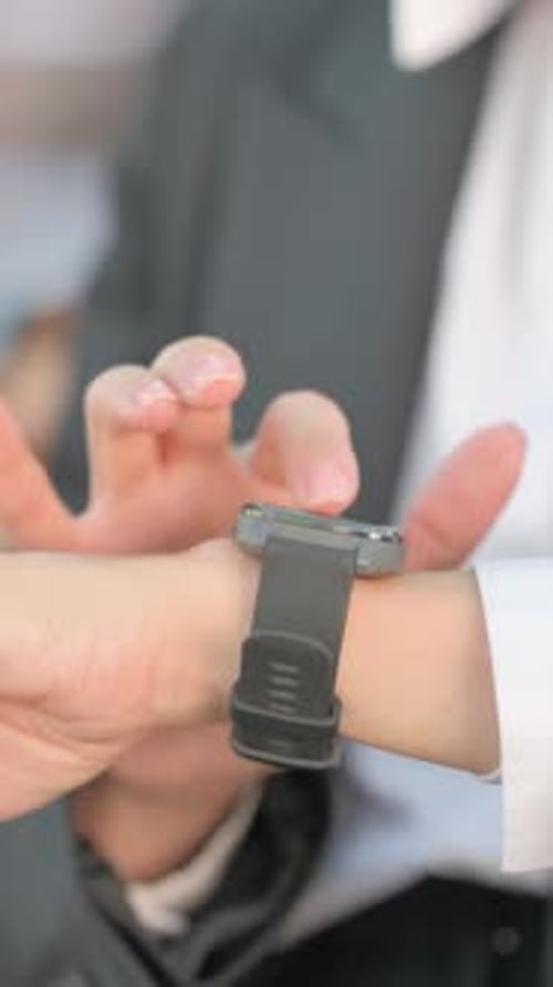 Close up of Woman Using Smart Watch Outdoor