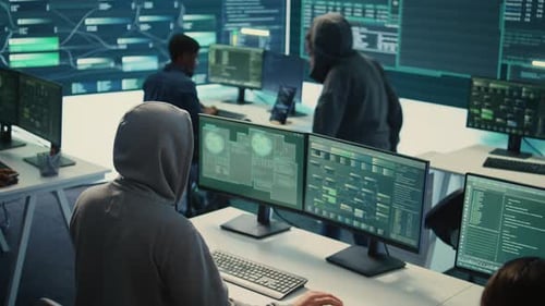 Hackers Typing in Modern Office Environment