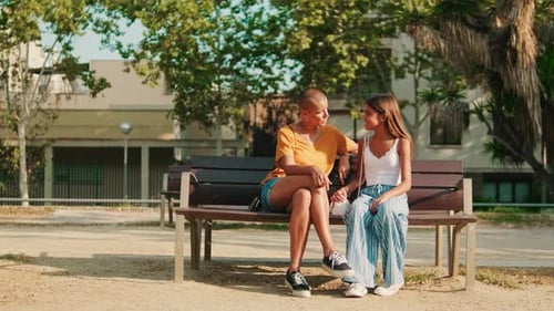 Mother and Daughter With Alopecia Bond in Park