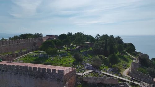 Aerial Video Alanya Castle s Towering Walls Overlooking the CrystalClear Mediterranean Waters