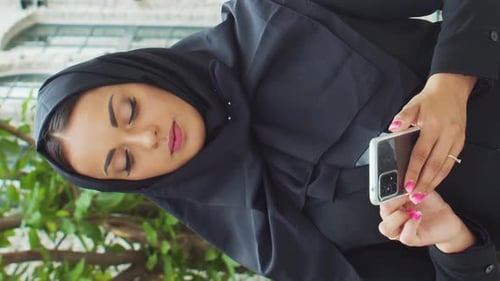 Portrait of Young and Confident Muslim Business Woman with in Hijab Middle Eastern Office Worker or