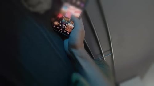 pov scrolling phone social media instagram in bed sad