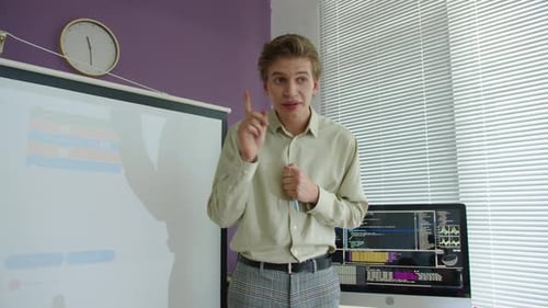 Man Giving Presentation in Office Setting
