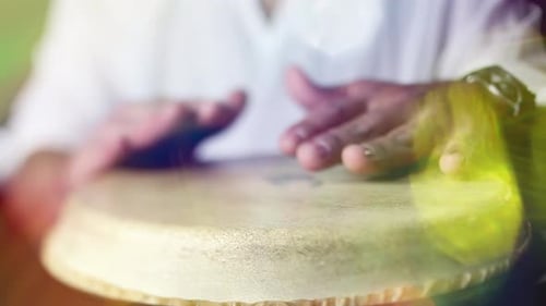 Male Percussionist Playing Congo Drums