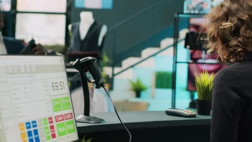 African American Shopper Buying an Elegant Suit Jacket From Clothing Store