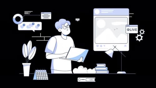 A person working on a laptop surrounded by creative elements.