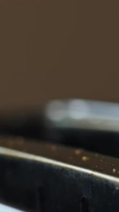 Freshly Toasted Bread Bursts From the Toaster Golden and Delicious Close Up Vertical Video