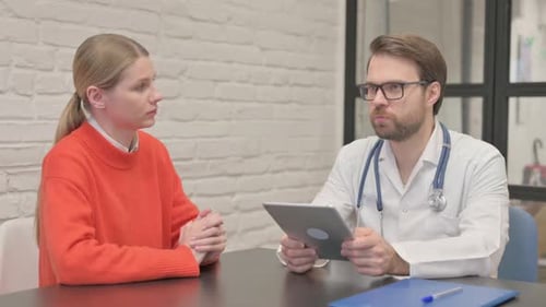 Close up of Doctor Talking with Patient