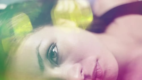 Woman's Glamorous Face, Extreme Close Up, Lying Down