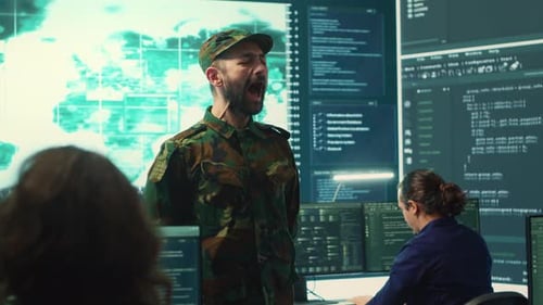 Soldier Giving Orders in a High Tech Office