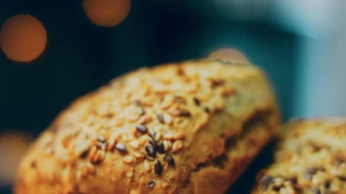 Two Freshly Baked Square Loaves of Bread with Seeds