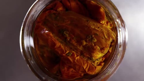 Preserved Tomatoes in a Mason Jar Close Up