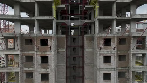 Aerial Video of Construction Equipment and Tower Build