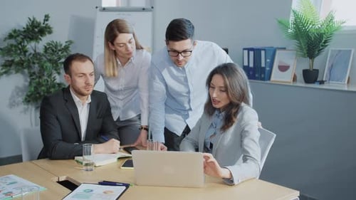 Team of Cauasian Business People Meeting in Office Conference Room Executive Team Business People