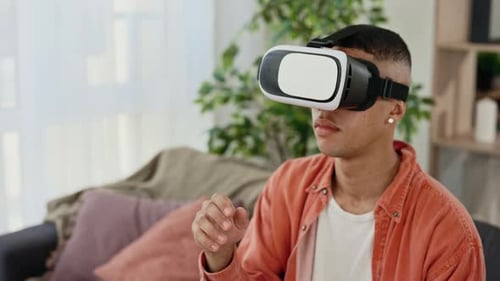 Man Using VR Headset in Living Room