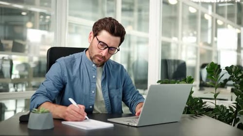 Manager Preparing for Presentation Checks Documents Does Paper Work